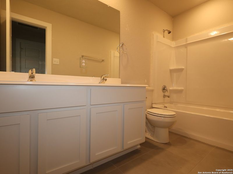 Furnished interior view inside a new home in Winding Brook, San Antonio (Image 11).