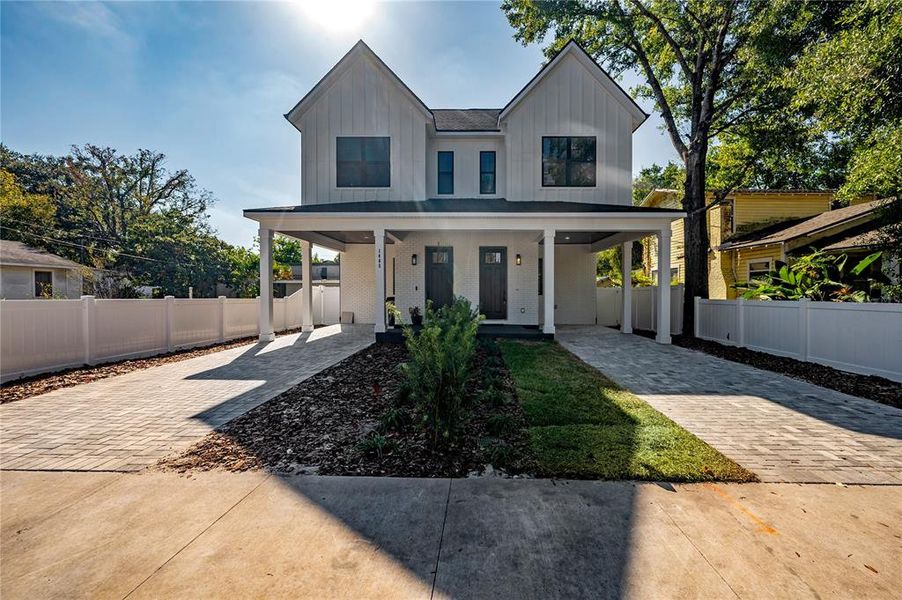 Front exterior of a new home in , Tampa, FL, highlighting curb appeal (Image 1).
