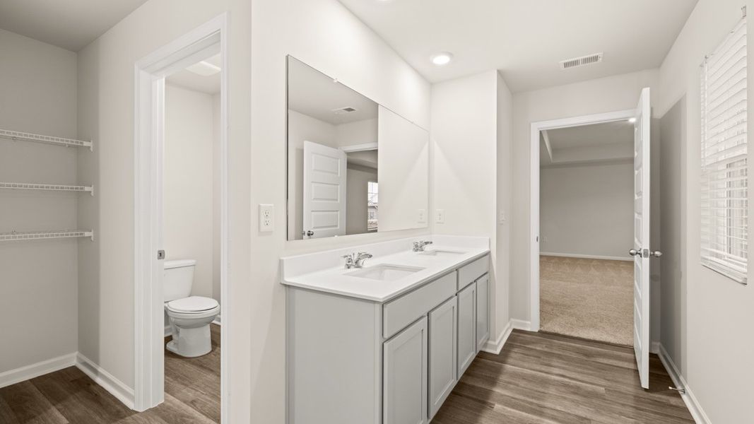 Representative furnished interior of a home built from the Galen by D.R. Horton in Preserve at Dove Creek, Statham (Image 10).