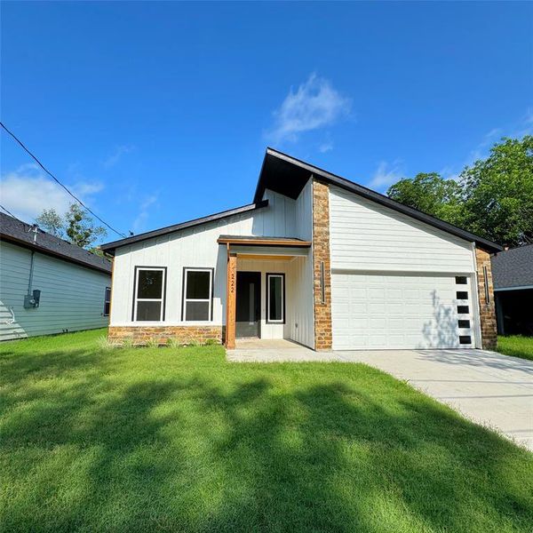 Front exterior of a new home in , Greenville, TX, highlighting curb appeal (Image 10).