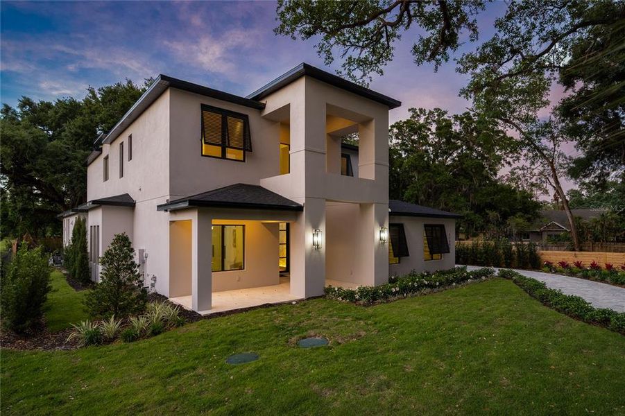 Front exterior of a new home in , Windermere, FL, highlighting curb appeal (Image 25).