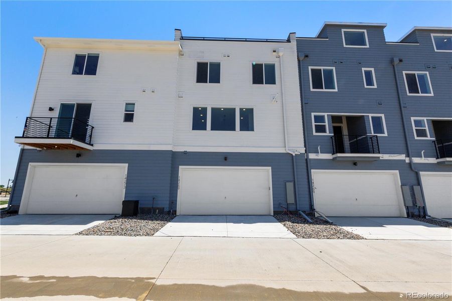 Front exterior of a new home in Dillon Pointe - Skyview, Broomfield, CO, highlighting curb appeal (Image 2).