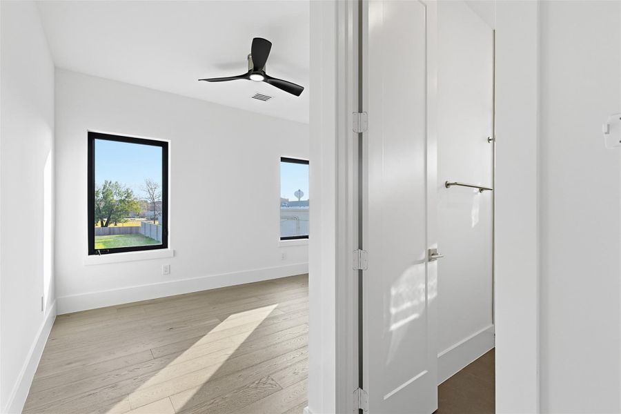 Same floorplan - different finishes. Another bedroom space highlighting the seamless transition between the sleeping area and the attached private ensuite.