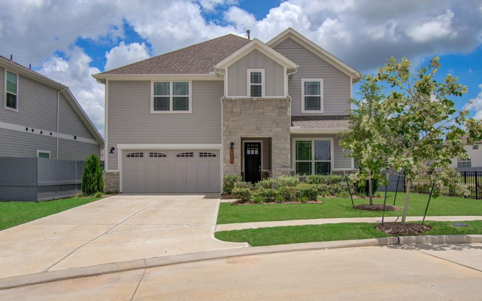Front exterior of a new home in , Fulshear, TX, highlighting curb appeal (Image 1). Front exterior of a new home in , Fulshear, TX, highlighting curb appeal (Image 1).