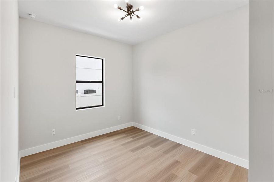 Spacious, unfurnished interior of a new home in , Port Charlotte (Image 49).
