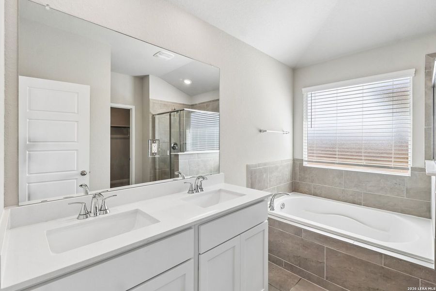 Furnished interior view inside a new home in Estancia Ranch - Premier Series, San Antonio (Image 11).
