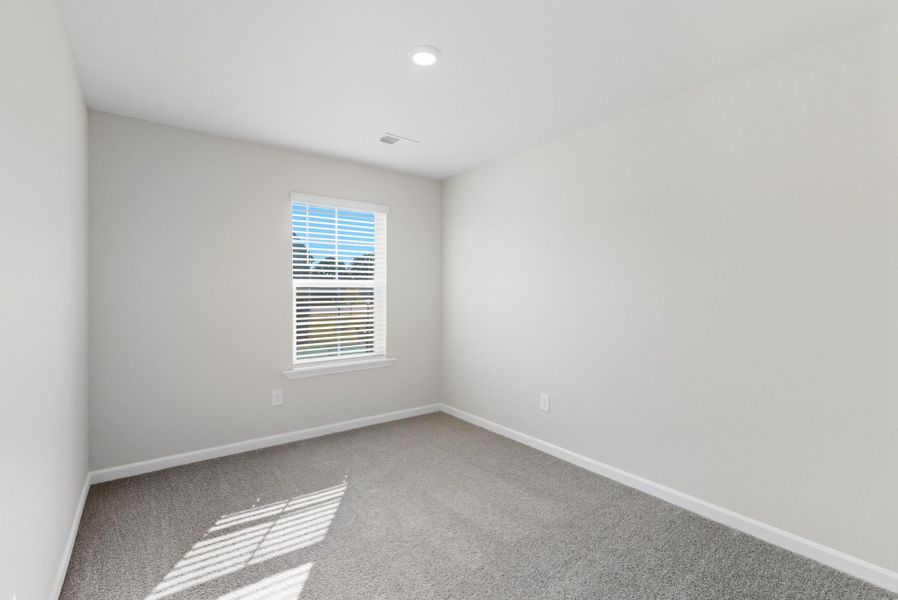 Representative unfurnished interior of a home built from the Palmetto II by McGuinn Homes in Clarke Townes, Anderson (Image 65).