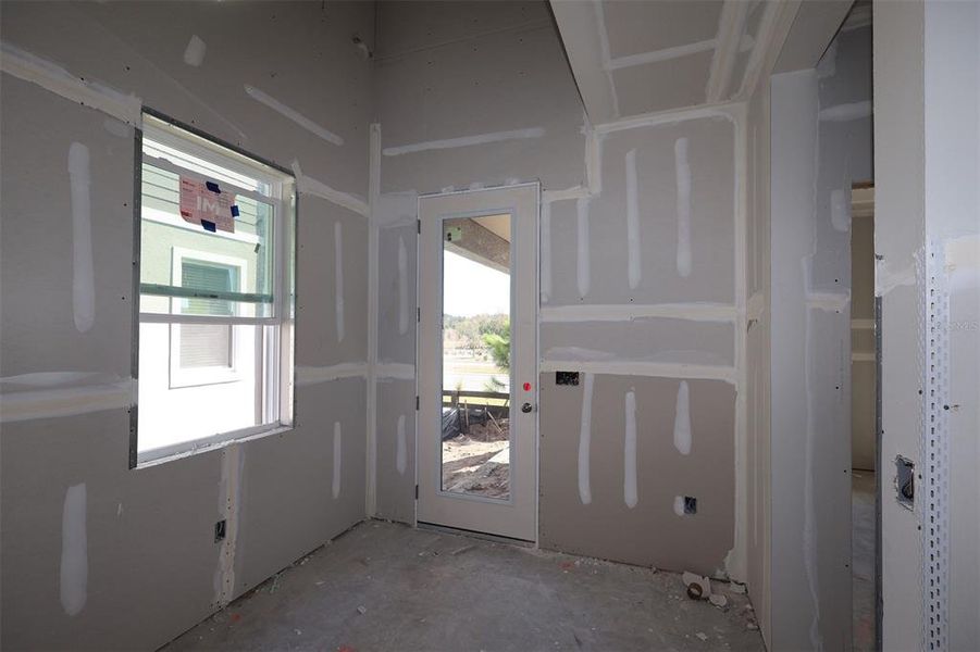 In-progress construction of a new home in Center Lake on the Park, St. Cloud, FL (Image 27).