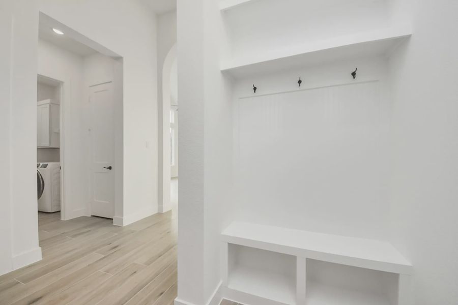 Representative unfurnished interior of a home built from the Bonneville by Chesmar Homes in Meridiana 50's and 60's, Manvel (Image 28).