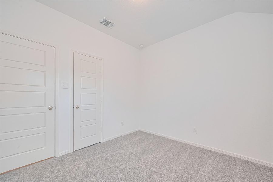 Spacious, unfurnished interior of a new home in Sunterra, Katy (Image 32).