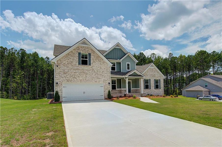 Front exterior of a new home in Saddleridge, Senoia, GA, highlighting curb appeal (Image 21).