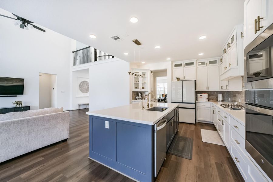 A spacious, gourmet kitchen featuring abundant cabinetry and generous countertop space. A spacious, gourmet kitchen featuring abundant cabinetry and generous countertop space.