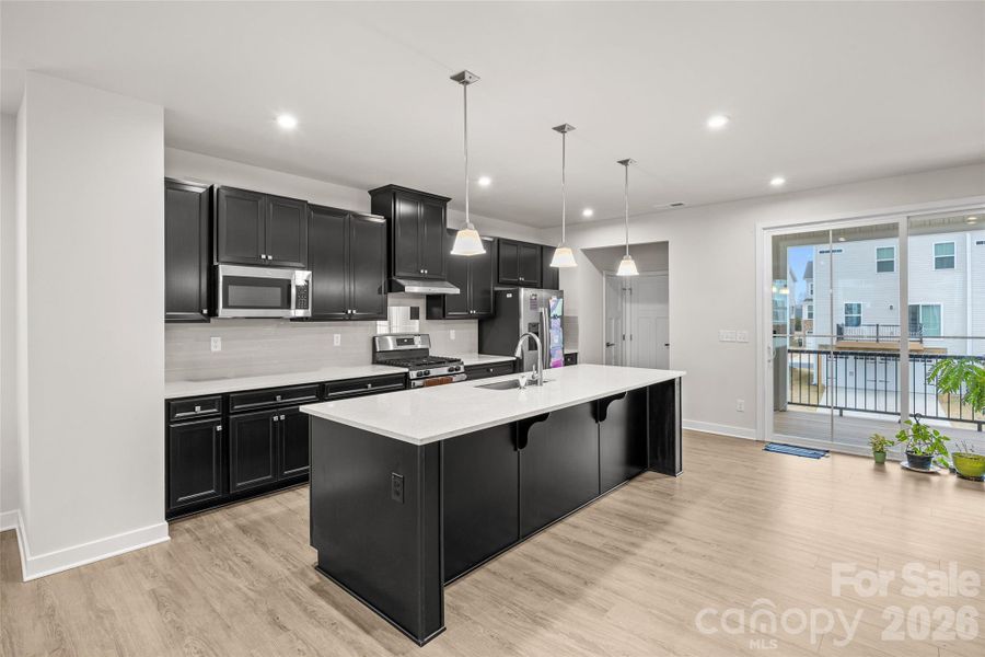 Furnished interior view inside a new home in , Huntersville (Image 6).