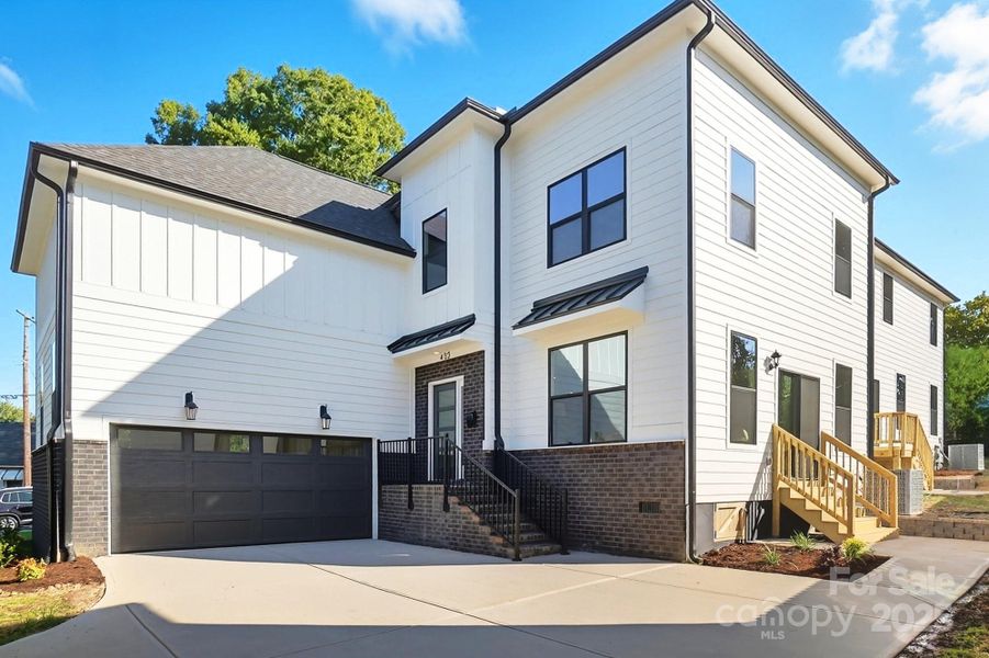 Front exterior of a new home in , Charlotte, NC, highlighting curb appeal (Image 23).