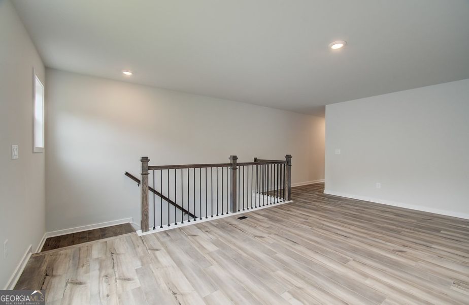 Spacious, unfurnished interior of a new home in Ponderosa Farms Reserve, Gainesville (Image 38).