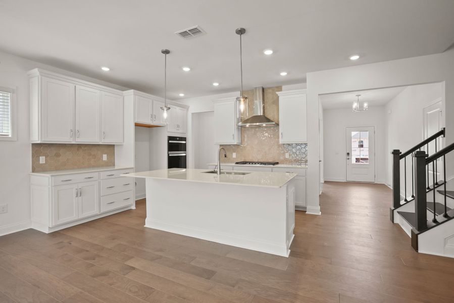 Spacious Kitchen with an Island Spacious Kitchen with an Island