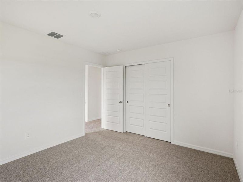 Spacious, unfurnished interior of a new home in Coasterra - Premier Series, Palmetto (Image 24).