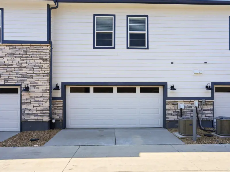 Exterior details and patio area of a home in Skyview at High Point, Aurora (Image 14).