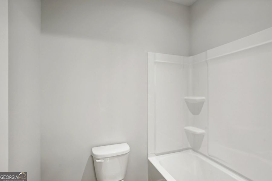 Furnished interior view inside a new home in Rosewood Lake Estates, Hoschton (Image 9).