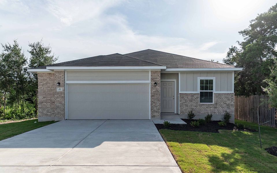 Front exterior of a home in the Grande Estates community, located in Bertram, TX (Image 10).