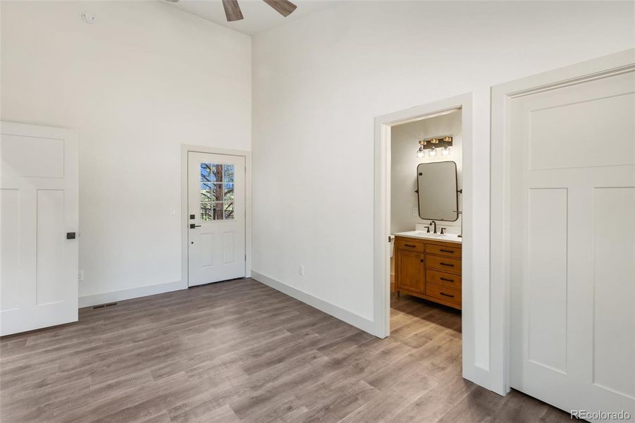 Bedroom walks out to deck  w attached bath