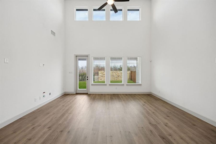 Beautiful flooring, high ceilings and a wall of windows....this dream home has it all!
