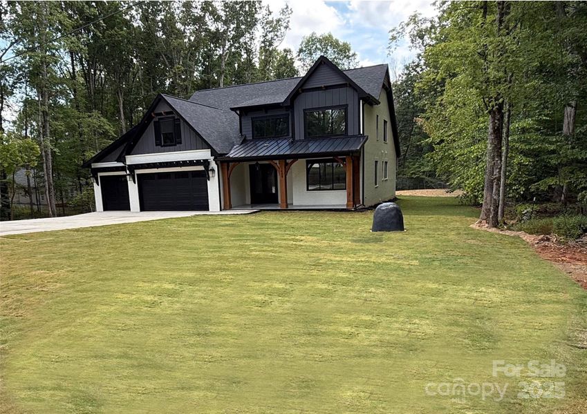 Front exterior of a new home in , Waxhaw, NC, highlighting curb appeal (Image 2).