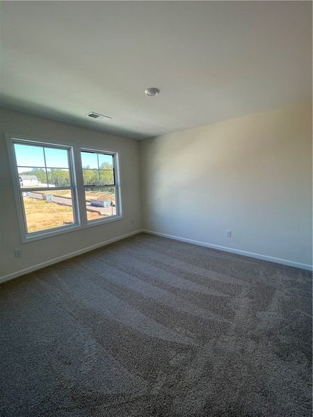 Spacious, unfurnished interior of a new home in Springwood Grove, Central (Image 22).