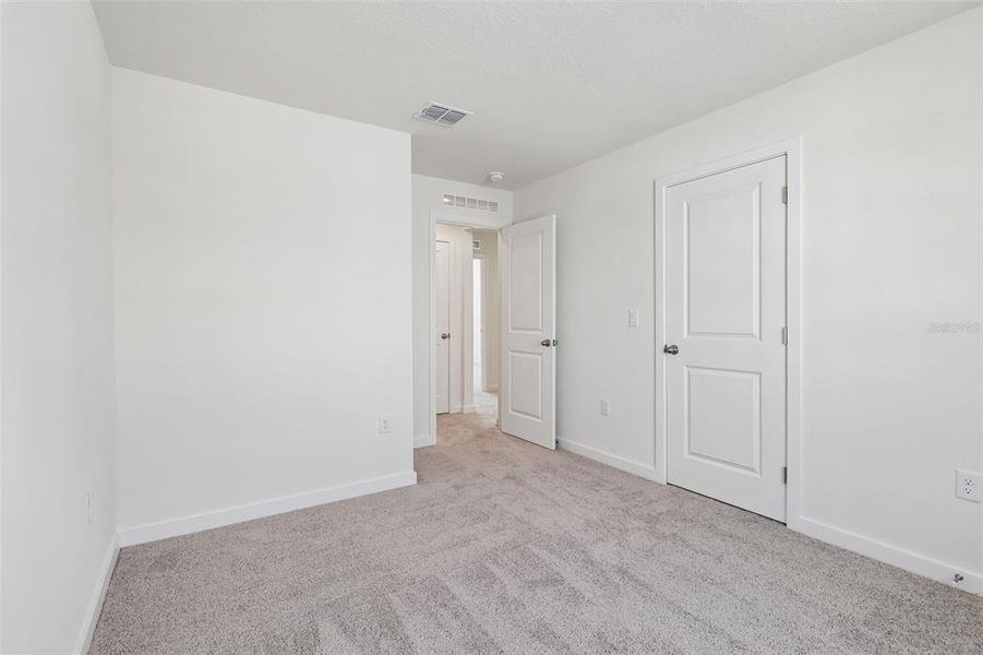 Spacious, unfurnished interior of a new home in Cyrene at Harmony, St. Cloud (Image 27). Spacious, unfurnished interior of a new home in Cyrene at Harmony, St. Cloud (Image 27).