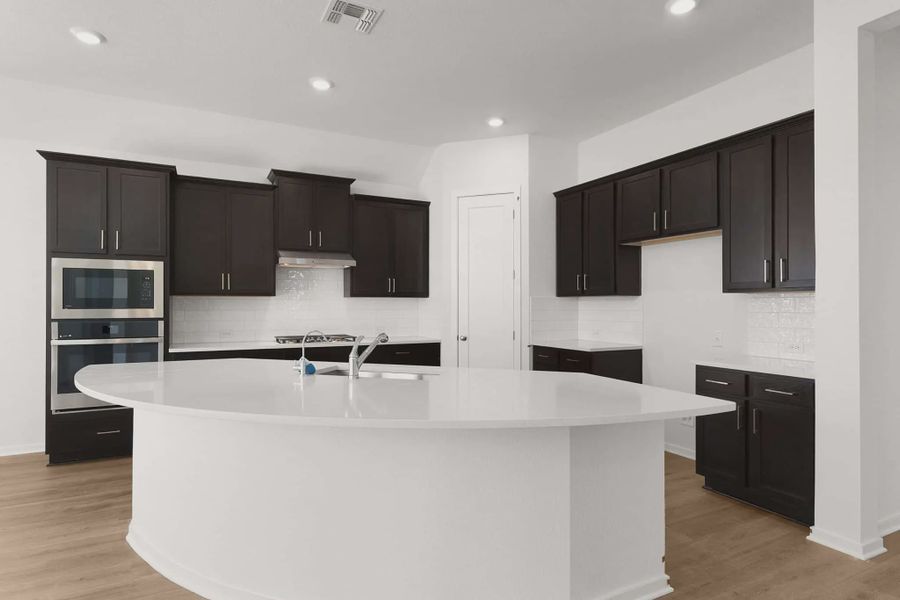 Representative furnished interior of a home built from the Mariah by Chesmar Homes in University Heights, McKinney (Image 13).