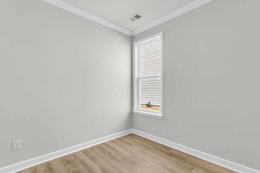 Spacious, unfurnished interior of a new home in Pineland Preserve, Summerville (Image 24).