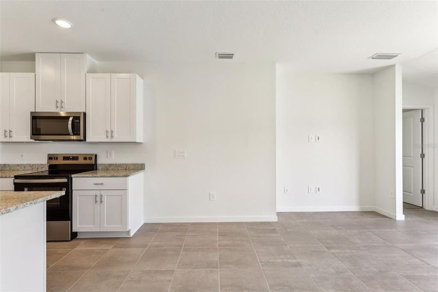 Spacious, unfurnished interior of a new home in Flagler Village - Classic Series, Palm Coast (Image 11).