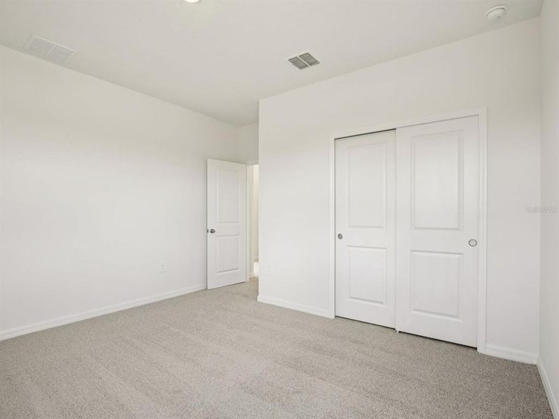 Spacious, unfurnished interior of a new home in Coasterra - Reserve Series, Palmetto (Image 37).