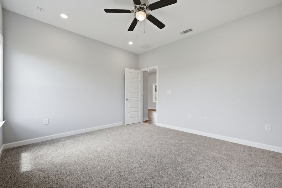 Spacious, unfurnished interior of a new home in Southern Charm, Crestview (Image 31).