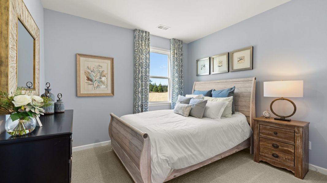 Representative furnished interior of a home built from the Hayden by D.R. Horton in Champion's Run, Lithonia (Image 8).