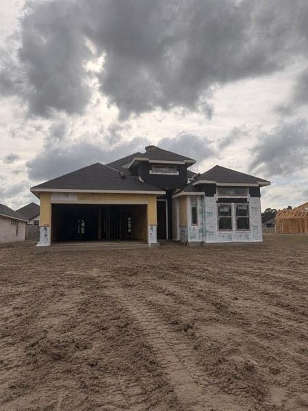 In-progress construction of a new home in The Meadows at Imperial Oaks, Oak Ridge North, TX (Image 4).