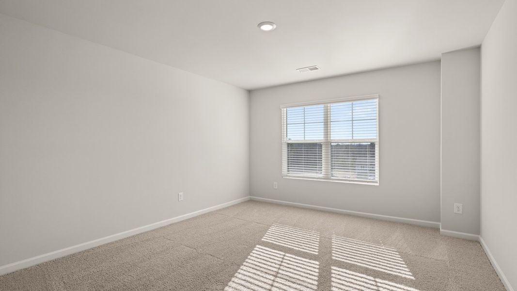 Representative unfurnished interior of a home built from the Mansfield by D.R. Horton in Southwind Village, Evans (Image 31).
