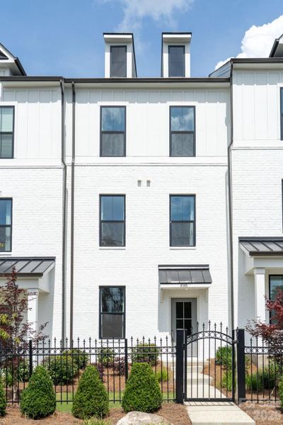 Front exterior of a new home in Alexander Providence Townhomes, Charlotte, NC, highlighting curb appeal (Image 21).
