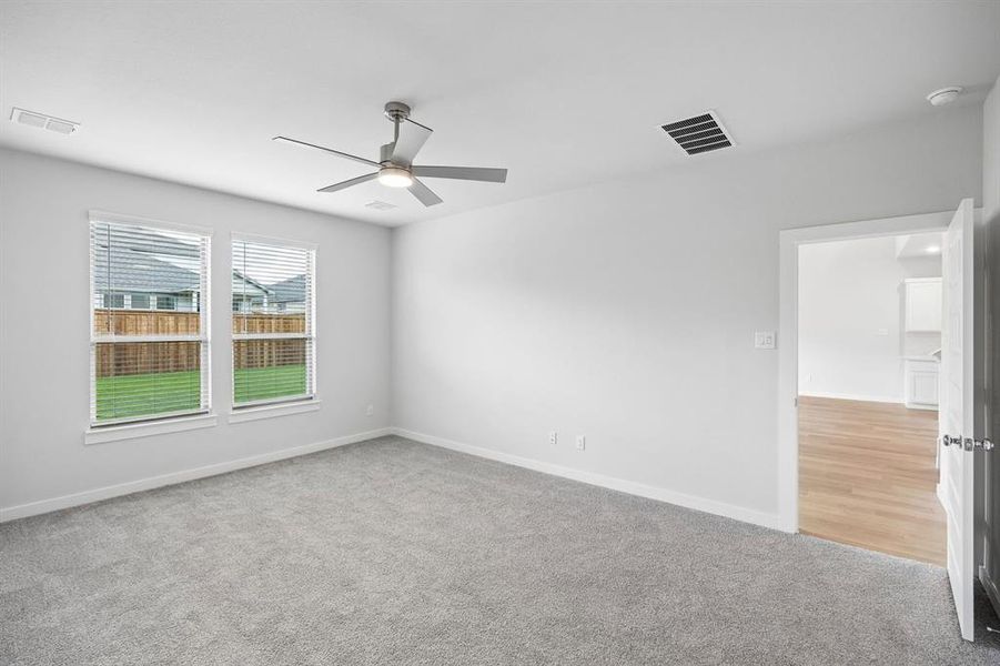 Primary Suite in the Winters home plan by Trophy Signature Homes – REPRESENTATIVE PHOTO