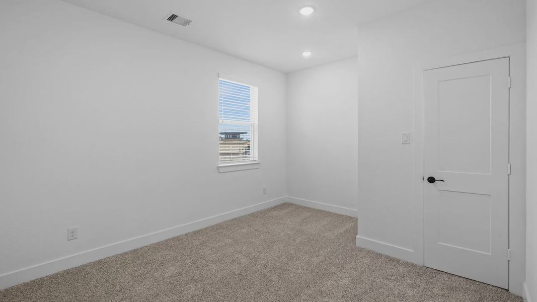 Representative unfurnished interior of a home built from the Rivers by Chesmar Homes in Sofi Lakes, Katy (Image 35).