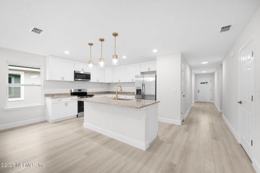 Furnished interior view inside a new home in , Jacksonville (Image 8). Furnished interior view inside a new home in , Jacksonville (Image 8).