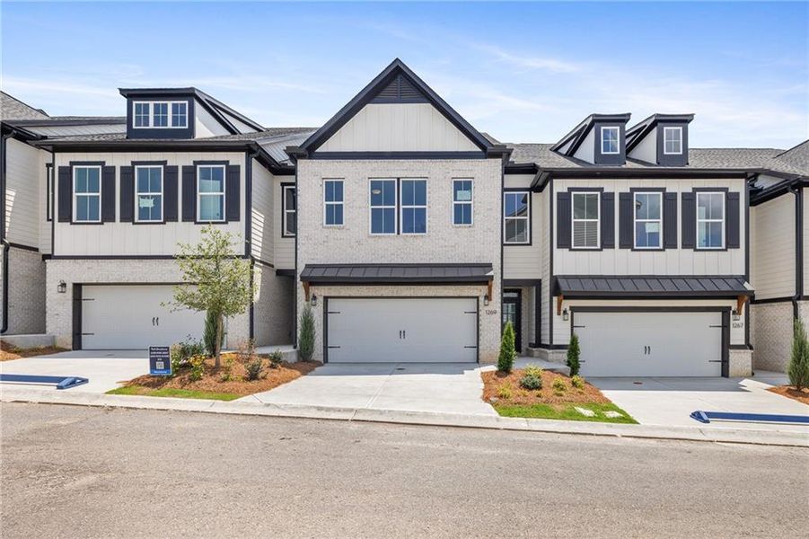 Front exterior of a new home in , Cumming, GA, highlighting curb appeal (Image 2).