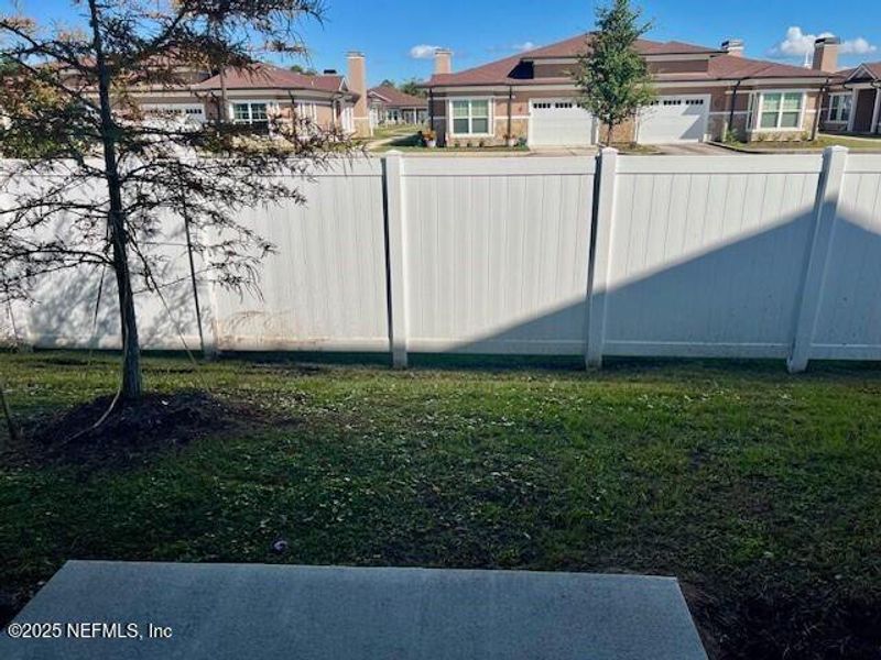 Exterior details and patio area of a home in Corsair, Middleburg (Image 1).