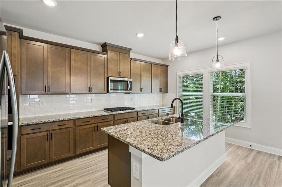 Furnished interior view inside a new home in Martin Springs - Estate Series, Lawrenceville (Image 5).