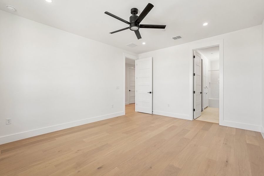 Spacious, unfurnished interior of a new home in Milky Way at River Place, Austin (Image 19).