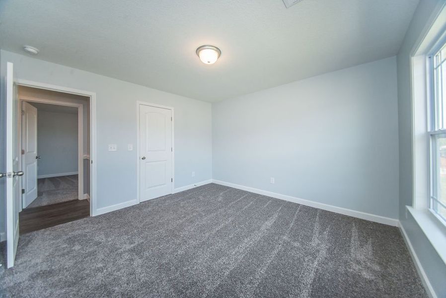 Representative unfurnished interior of a home built from the Franklin by Enchanted Homes in Guadalupe Heights, Seguin (Image 43).
