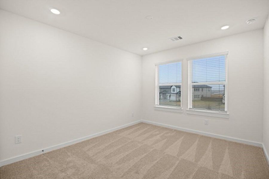 Spacious, unfurnished interior of a new home in Creekhaven, Iowa Colony (Image 25).