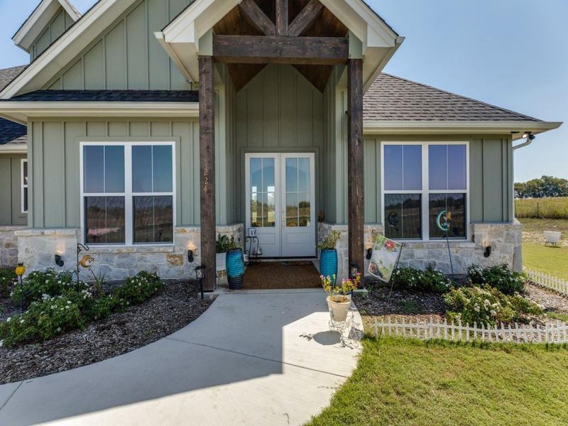 Exterior details and patio area of a home in , New Fairview (Image 22).