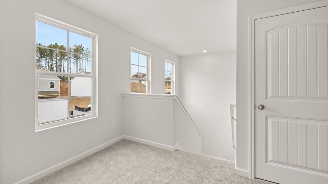 Spacious, unfurnished interior of a new home in Parkside at Carter Grove, Cartersville (Image 28).