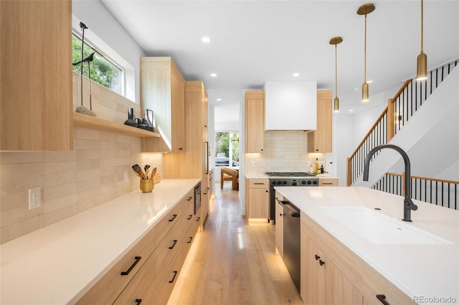 kitchen has direct access to the dining are through the passthrough pantry area